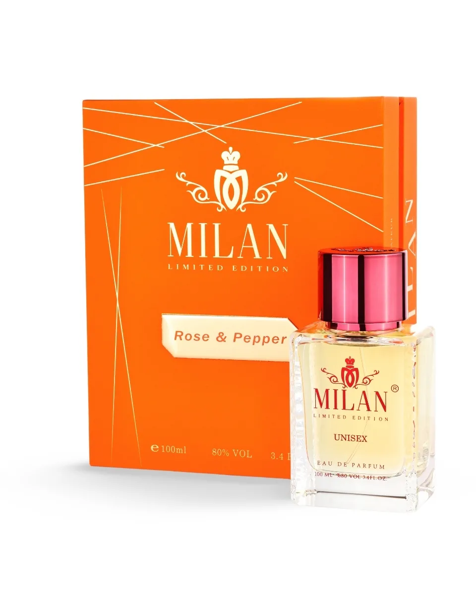 Milan Limited Edition perfume bottle beside its bright orange box, labeled Rose & Pepper.