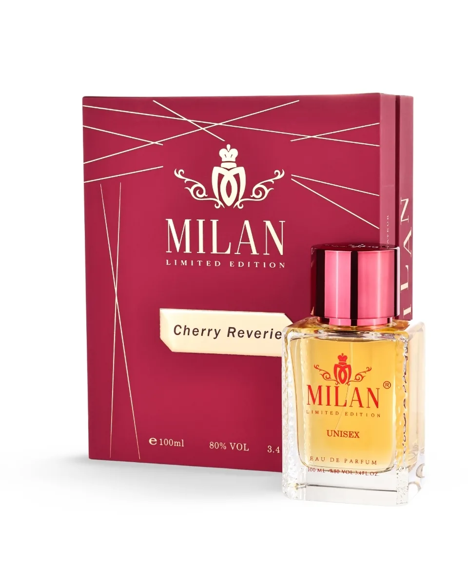 Milan Cherry Reverie limited edition perfume box with a pink-capped glass bottle of yellow perfume beside it.