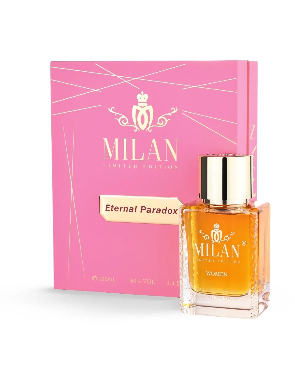 Pink Milan Limited Edition perfume box with gold detailing beside a square glass bottle of Eternal Paradox Women fragrance with a gold cap and amber liquid